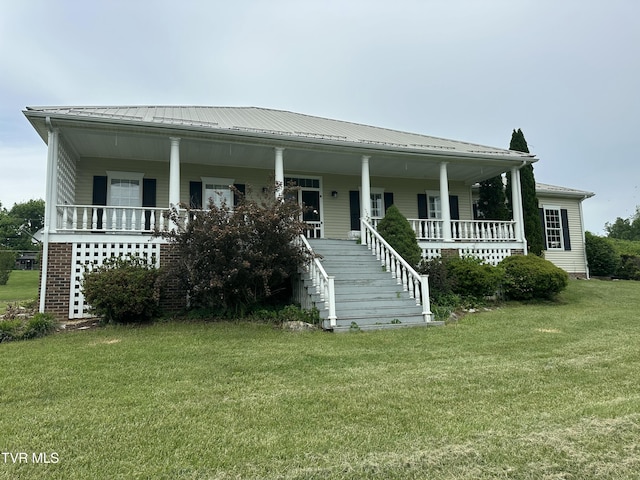 390 Springdale Dr, Bristol, TN 37620 - view of front facade featuring a porch, a front yard, and metal roof