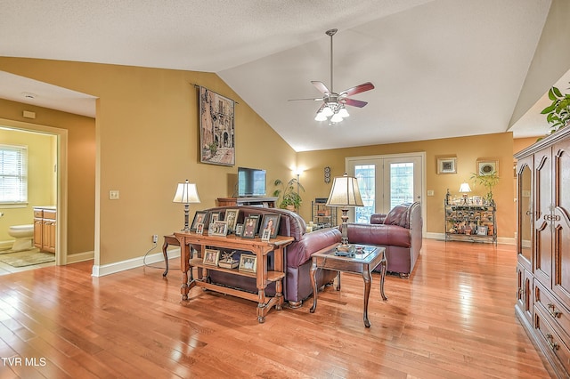 105 Morse Dr, Bristol, TN 37620 - living room with lofted ceiling, a ceiling fan, light wood finished floors, and healthy amount of natural light