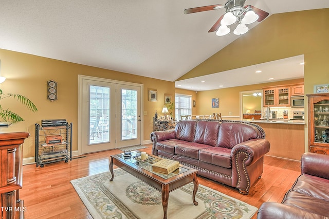 105 Morse Dr, Bristol, TN 37620 - living room with ceiling fan, light wood-style flooring, and high vaulted ceiling