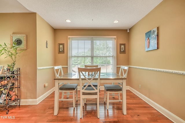 105 Morse Dr, Bristol, TN 37620 - dining room with wood finished floors, a textured ceiling, baseboards, and recessed lighting