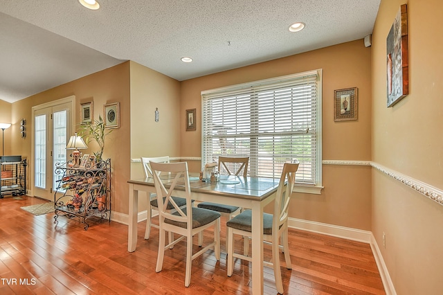 105 Morse Dr, Bristol, TN 37620 - dining area with hardwood / wood-style floors, baseboards, a textured ceiling, and recessed lighting