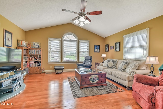 105 Morse Dr, Bristol, TN 37620 - living area with ceiling fan, wood-type flooring, lofted ceiling, baseboards, and a textured ceiling
