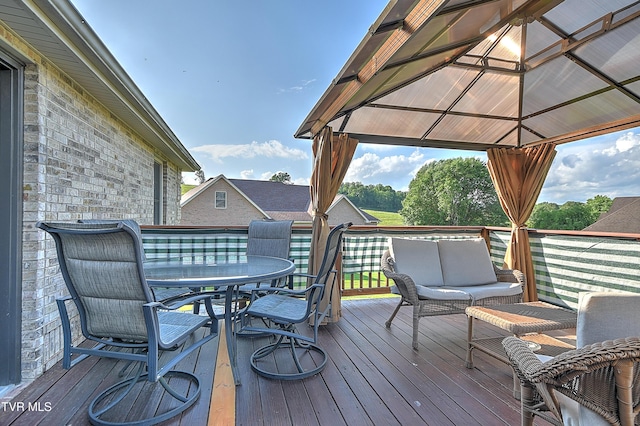 105 Morse Dr, Bristol, TN 37620 - wooden terrace with outdoor dining area and a gazebo