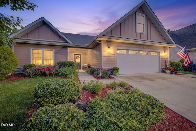 2420 Edinburgh Channel Rd, Kingsport, TN 37664 - craftsman-style house featuring board and batten siding, concrete driveway, roof with shingles, and a lawn