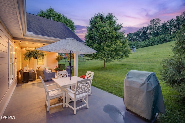 2420 Edinburgh Channel Rd, Kingsport, TN 37664 - patio terrace at dusk featuring a patio area, a yard, area for grilling, and an outdoor living space