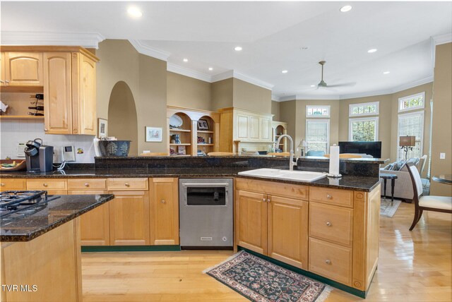 21390 Sheffield Ct, Abingdon, VA 24210 - kitchen featuring stainless steel dishwasher, open floor plan, a sink, light wood-type flooring, and dark stone countertops