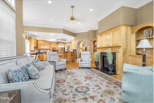 21390 Sheffield Ct, Abingdon, VA 24210 - living room with a ceiling fan, light wood-type flooring, a fireplace, recessed lighting, and ornamental molding