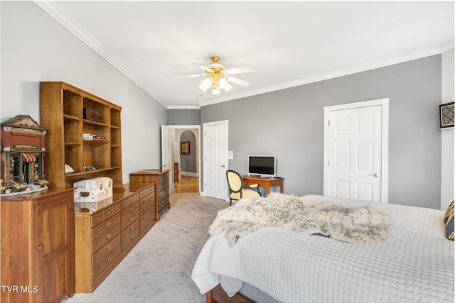 21390 Sheffield Ct, Abingdon, VA 24210 - bedroom with light carpet, crown molding, a ceiling fan, baseboards, and arched walkways