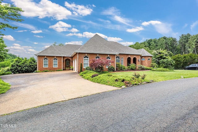 21390 Sheffield Ct, Abingdon, VA 24210 - view of front of home with concrete driveway, a front lawn, roof with shingles, and brick siding