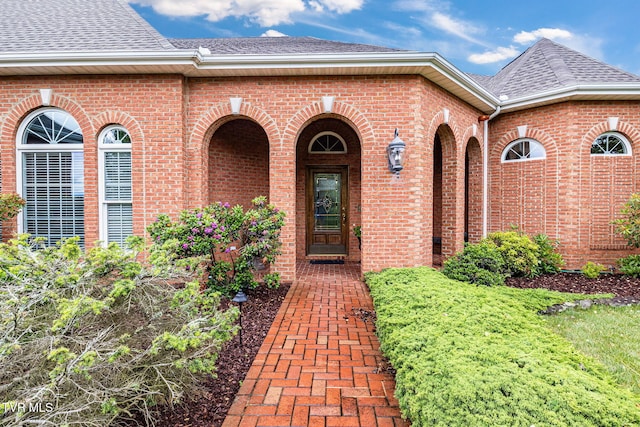 21390 Sheffield Ct, Abingdon, VA 24210 - view of exterior entry featuring brick siding and roof with shingles