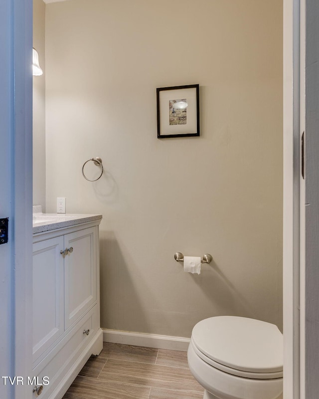 1016 Konnarock Rd # 1, Kingsport, TN 37664 - bathroom with baseboards, vanity, and toilet