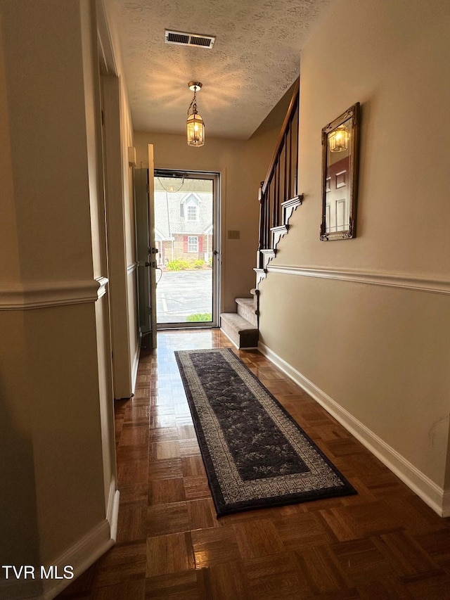 210 Spring St Unit C3, Blountville, TN 37617 - doorway with baseboards, stairway, and a textured ceiling