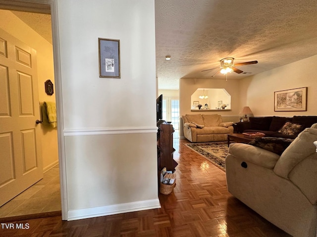 210 Spring St Unit C3, Blountville, TN 37617 - living area with a ceiling fan, a textured ceiling, and baseboards