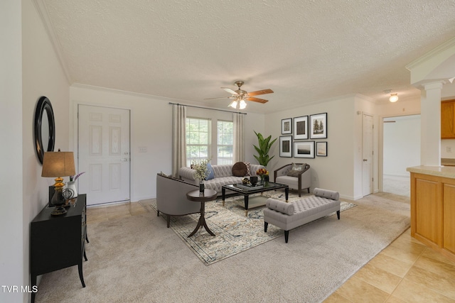 108 Richards Rd, Rogersville, TN 37857 - living room with a textured ceiling, ceiling fan, decorative columns, crown molding, and light carpet