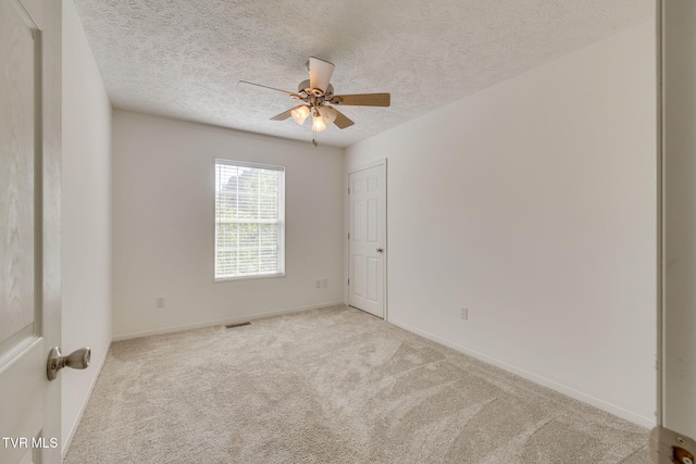 108 Richards Rd, Rogersville, TN 37857 - empty room featuring carpet flooring, a ceiling fan, a textured ceiling, and baseboards
