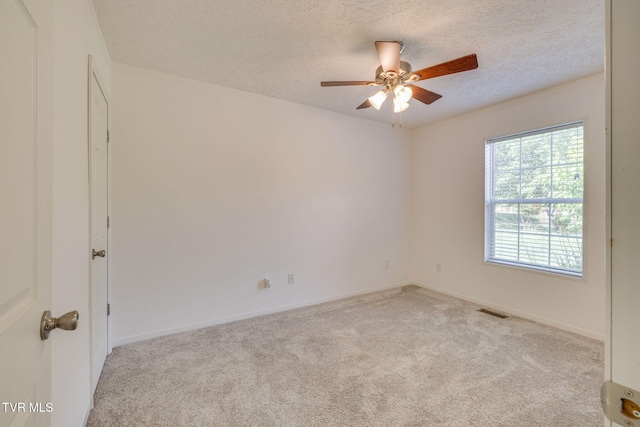 108 Richards Rd, Rogersville, TN 37857 - spare room with light carpet, a textured ceiling, ceiling fan, and baseboards