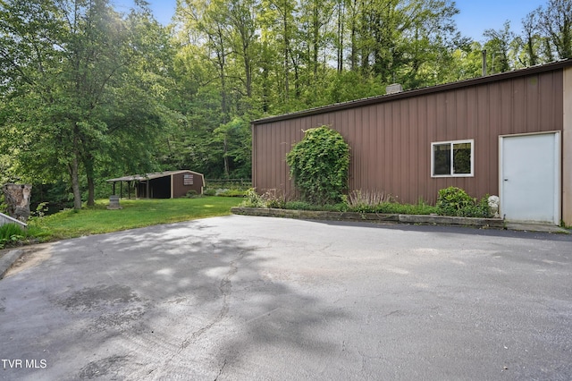 11316 Boggs Hollow Rd, Pound, VA 24279 - view of property exterior featuring an outbuilding and a lawn