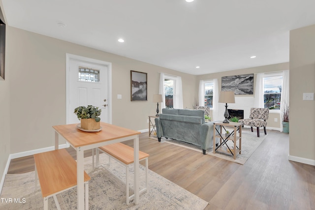 1241 Virginia Ave, Bristol, TN 37620 - living area featuring baseboards, light wood finished floors, recessed lighting, and a fireplace