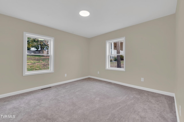 1241 Virginia Ave, Bristol, TN 37620 - carpeted spare room featuring baseboards