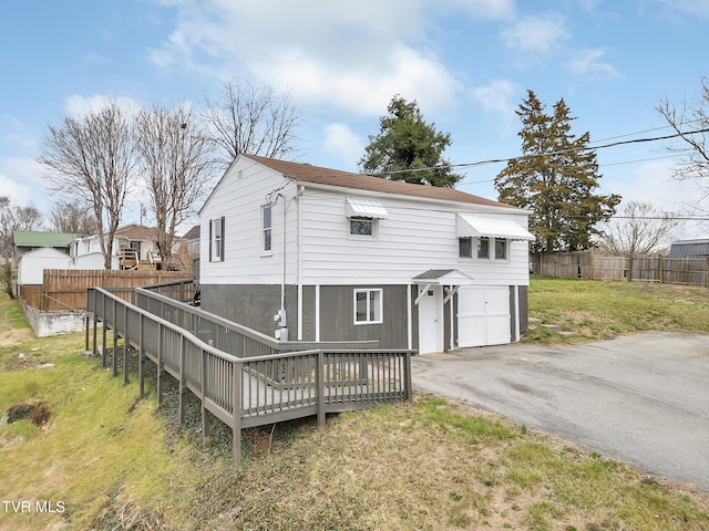 1241 Virginia Ave, Bristol, TN 37620 - back of house featuring driveway, a deck, and a garage