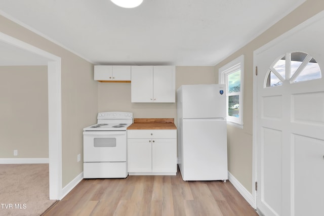 1241 Virginia Ave, Bristol, TN 37620 - kitchen with white appliances, white cabinetry, light wood-style floors, and baseboards