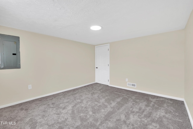 1241 Virginia Ave, Bristol, TN 37620 - unfurnished room with electric panel, baseboards, carpet, and a textured ceiling