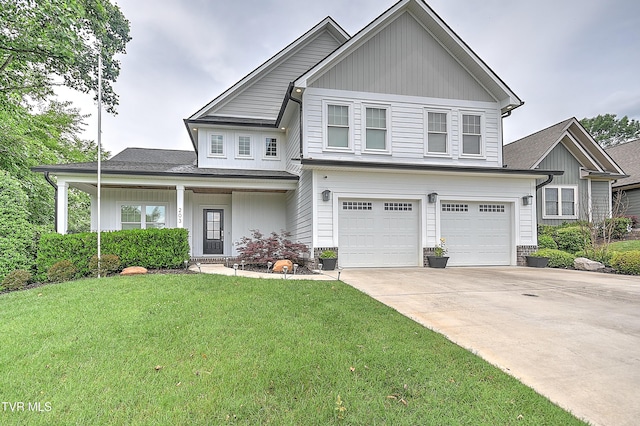 203 Riverwatch Cir, Kingsport, TN 37660 - view of front of house featuring an attached garage, a front lawn, and concrete driveway