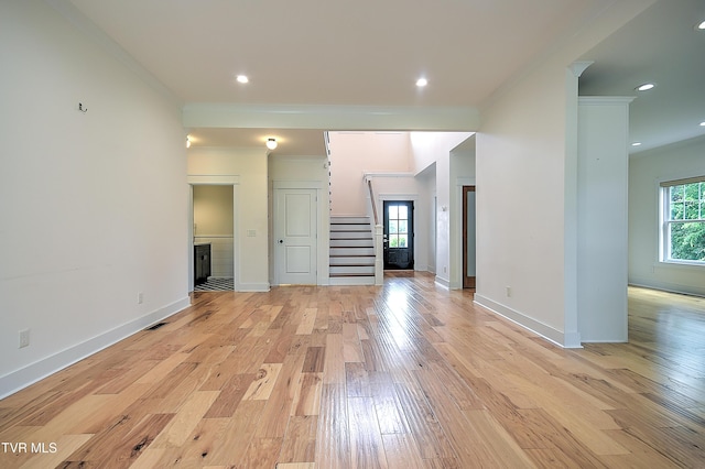 203 Riverwatch Cir, Kingsport, TN 37660 - unfurnished living room with ornamental molding, stairway, light wood-style floors, baseboards, and recessed lighting