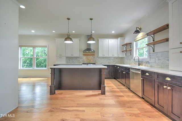 203 Riverwatch Cir, Kingsport, TN 37660 - kitchen with dishwasher, open shelves, light countertops, a kitchen island, and decorative backsplash