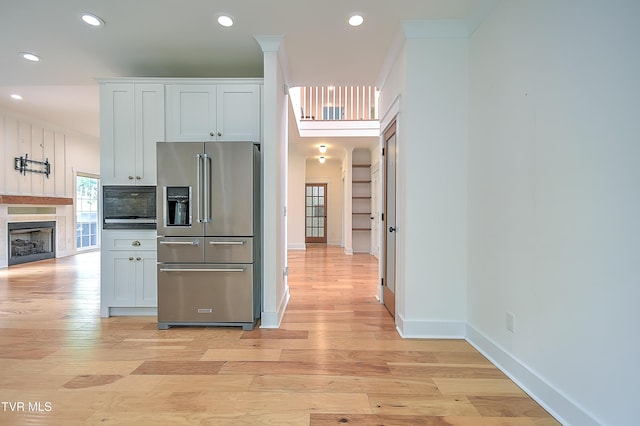 203 Riverwatch Cir, Kingsport, TN 37660 - kitchen with high quality fridge, light wood finished floors, recessed lighting, baseboards, and backsplash