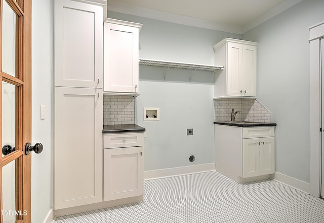 203 Riverwatch Cir, Kingsport, TN 37660 - laundry room with hookup for a washing machine, cabinet space, electric dryer hookup, and baseboards