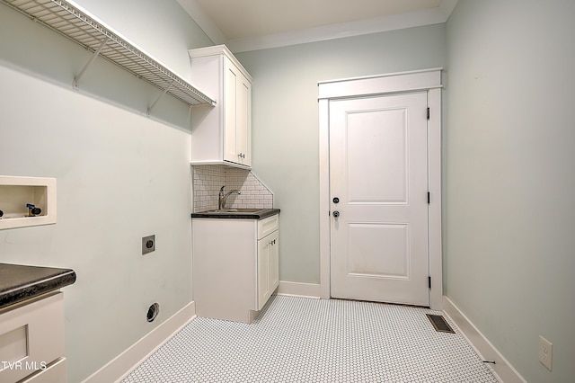 203 Riverwatch Cir, Kingsport, TN 37660 - laundry room featuring hookup for an electric dryer, hookup for a washing machine, a sink, baseboards, and light tile patterned flooring