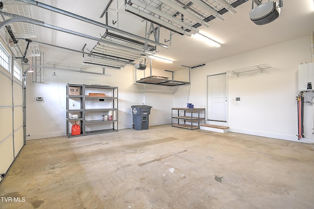 203 Riverwatch Cir, Kingsport, TN 37660 - garage with a garage door opener and baseboards