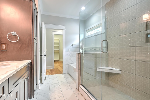 203 Riverwatch Cir, Kingsport, TN 37660 - full bath featuring a stall shower, marble finish flooring, vanity, and a tub
