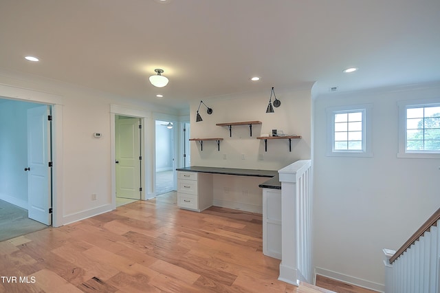 203 Riverwatch Cir, Kingsport, TN 37660 - kitchen featuring dark countertops, open shelves, crown molding, white cabinets, and light wood-type flooring