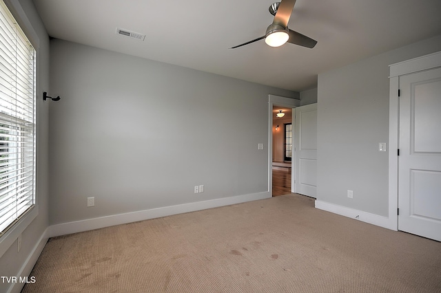 203 Riverwatch Cir, Kingsport, TN 37660 - unfurnished bedroom featuring carpet, multiple windows, and baseboards