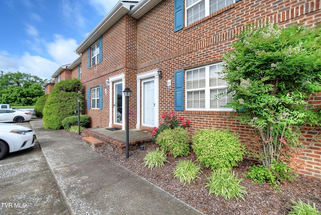 24 Lexington Ct Unit 6, Johnson City, TN 37615 - view of property exterior with brick siding