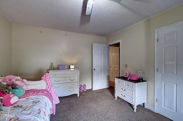 24 Lexington Ct Unit 6, Johnson City, TN 37615 - bedroom featuring dark carpet, a textured ceiling, and a ceiling fan
