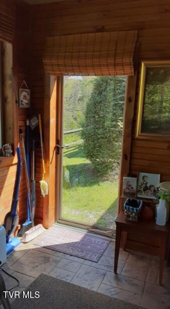 405 Coldwater Dr Unit 405, Johnson City, TN 37601 - doorway to outside featuring wood walls