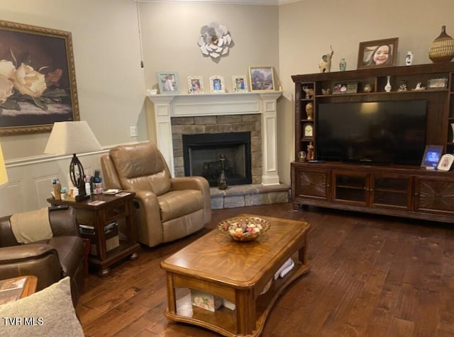 405 Coldwater Dr Unit 405, Johnson City, TN 37601 - living room with dark wood-type flooring, a fireplace with raised hearth, and ornamental molding