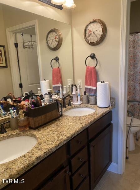 405 Coldwater Dr Unit 405, Johnson City, TN 37601 - full bathroom with double vanity, tile patterned floors, and toilet