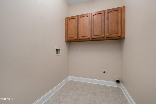 223 Avonlea Pl, Johnson City, TN 37604 - washroom with cabinet space, washer hookup, hookup for an electric dryer, baseboards, and light tile patterned floors