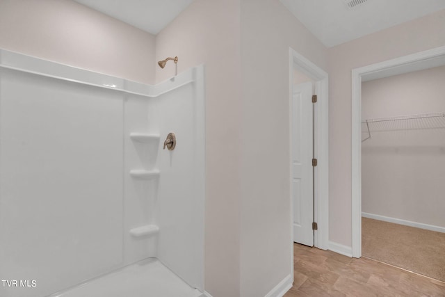 125 Crawford Cir, Bristol, TN 37620 - full bath featuring a shower, baseboards, and a spacious closet