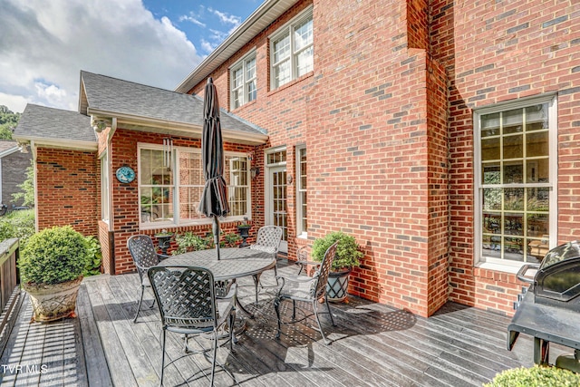 5621 John Gaines Blvd, Kingsport, TN 37664 - wooden deck with outdoor dining area and a grill