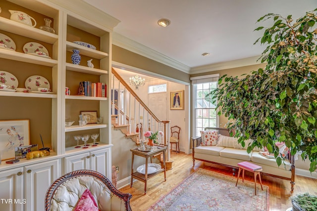5621 John Gaines Blvd, Kingsport, TN 37664 - living room with ornamental molding, light wood-style flooring, stairs, and baseboards