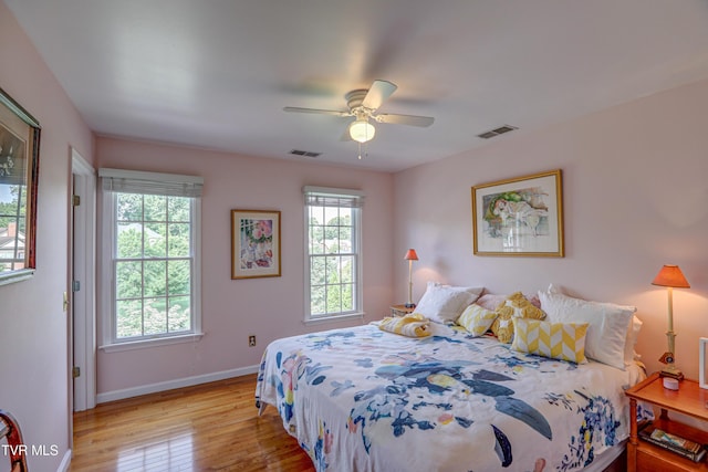 5621 John Gaines Blvd, Kingsport, TN 37664 - bedroom with hardwood / wood-style flooring, baseboards, and ceiling fan
