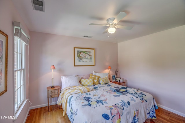 5621 John Gaines Blvd, Kingsport, TN 37664 - bedroom featuring light wood-style floors, baseboards, and a ceiling fan