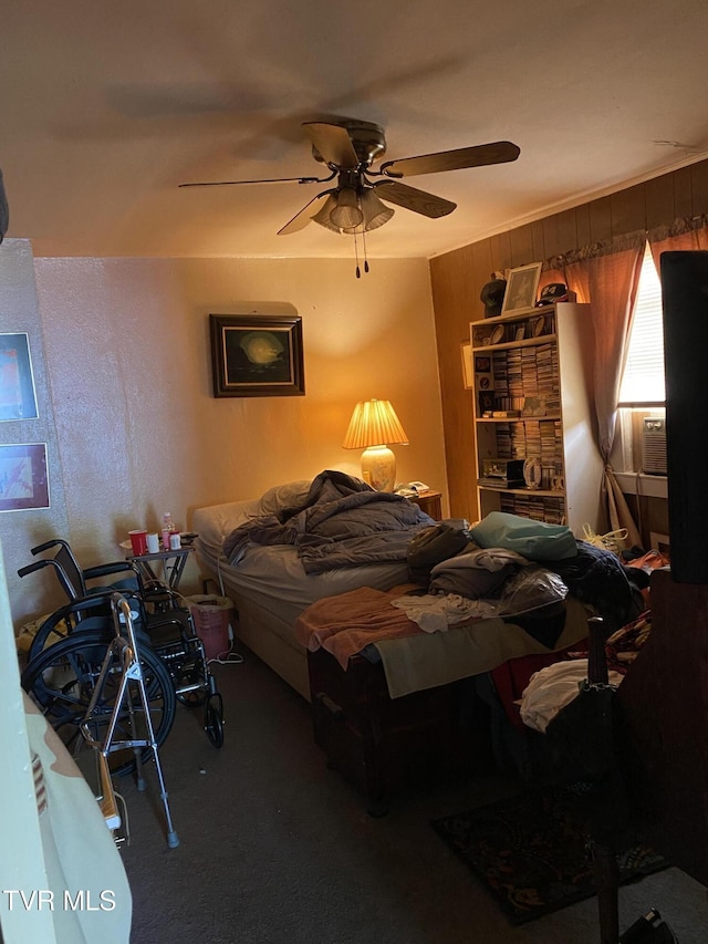 4228 Sullivan Gardens Dr, Kingsport, TN 37660 - bedroom with carpet flooring, wooden walls, cooling unit, and ceiling fan