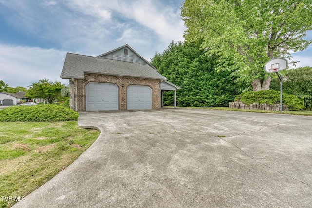 3510 Bondwood Cir, Johnson City, TN 37604 - view of home's exterior featuring concrete driveway, brick siding, roof with shingles, and a garage