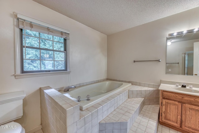 3510 Bondwood Cir, Johnson City, TN 37604 - full bath featuring toilet, a bath, vanity, a textured ceiling, and tile patterned flooring